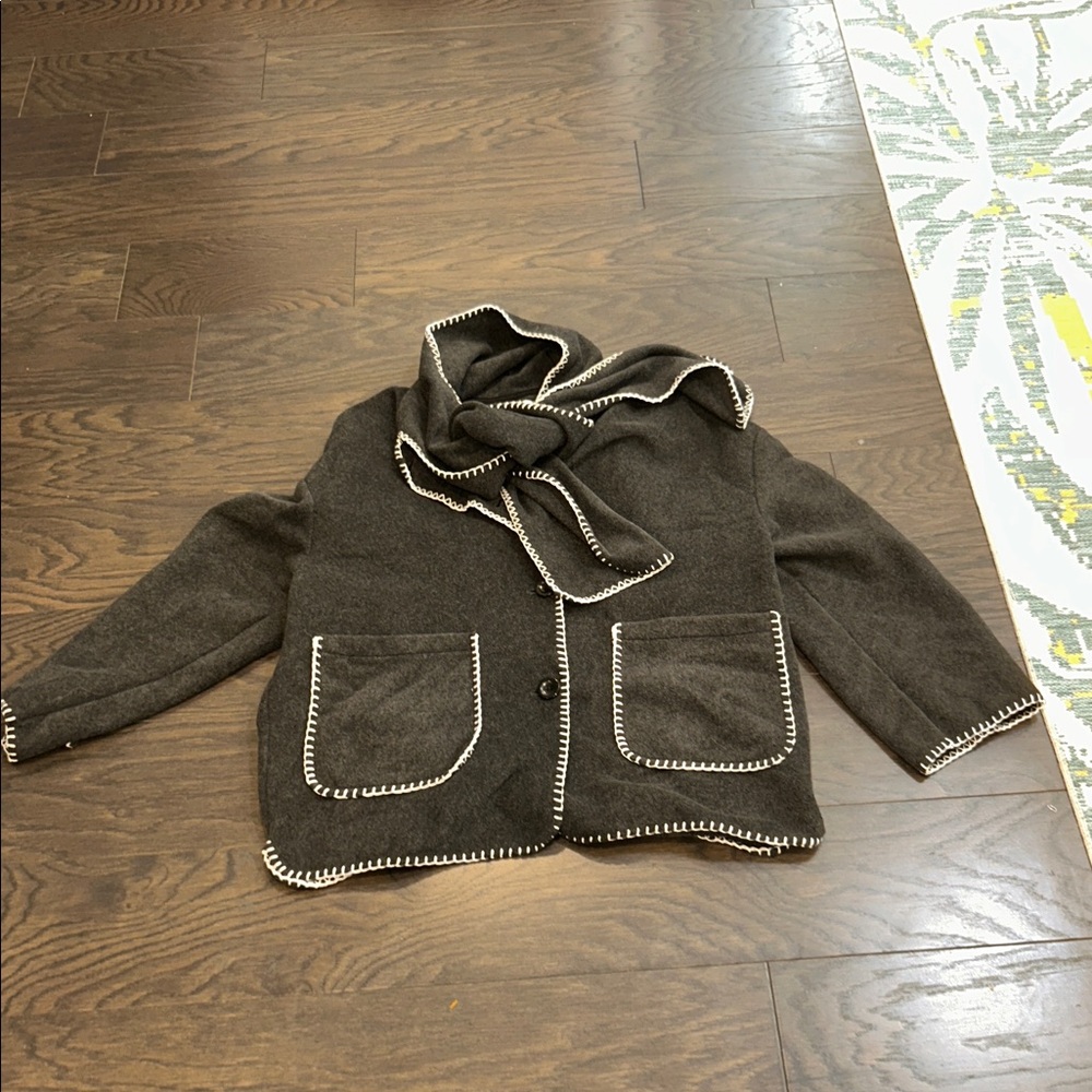 Ellen Reyes Chic Black jacket with White Trim